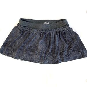 MPG athletic skirt with back zipper pocket. Size M